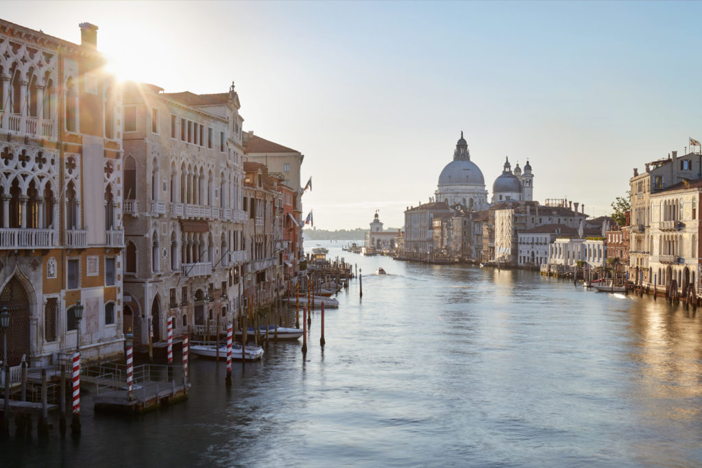 Grand Canal in Venice with Saint Mary of Health basilica, sun in